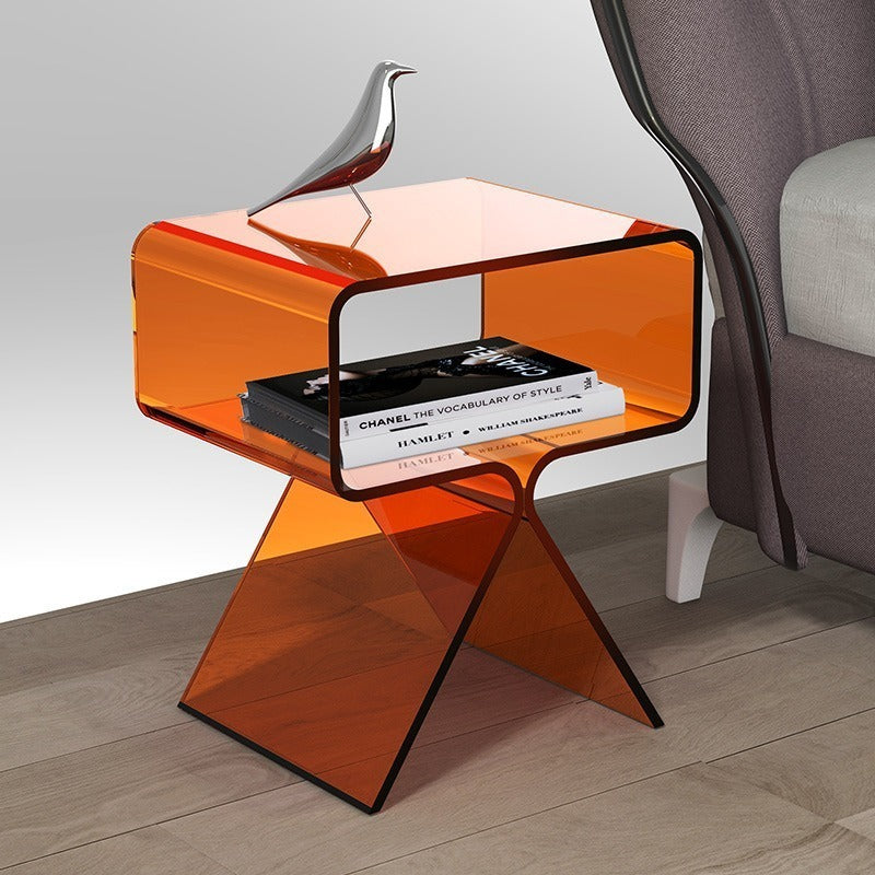 Transparent acrylic side table shown at 39x30x45cm size beside a sofa arm for scale reference
