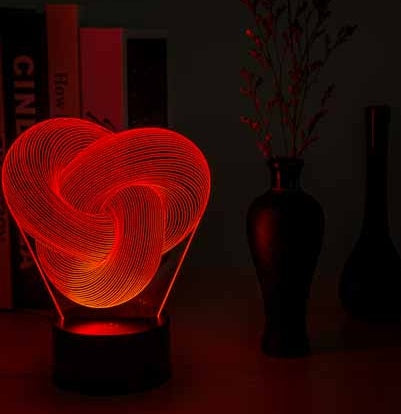 Twist 3D acrylic LED night lamp showing all seven color options side by side
