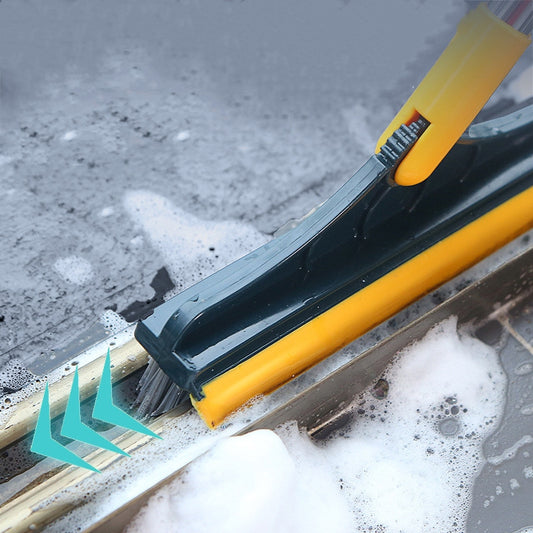Close up of V broom bristles and rubber wiper edge