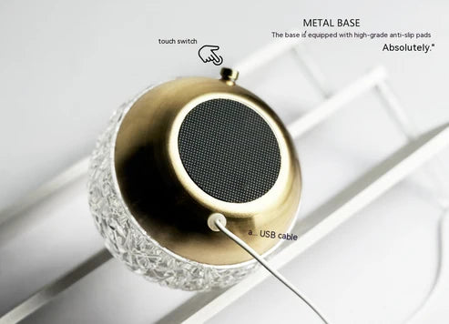 Water ripple projector crystal mood lamp gold metal base close up detail